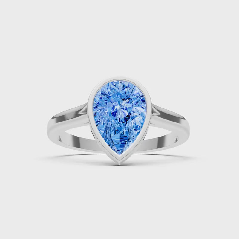Swiss Blue Topaz Pear Shape Bezel Set Solitaire Ring