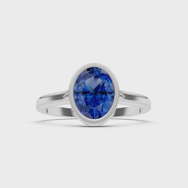 Blue Sapphire Oval Shape Bezel Set Solitaire Ring