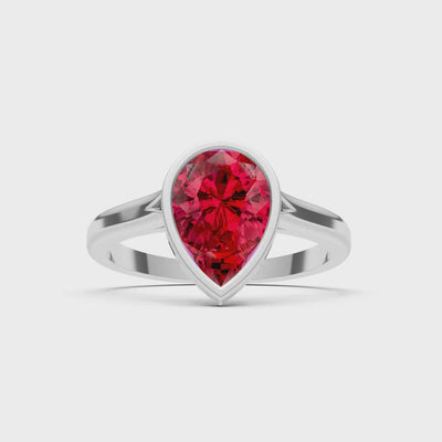 Ruby Pear Shape Bezel Set Solitaire Ring