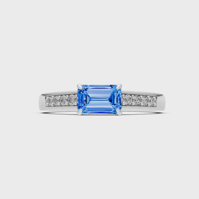 Swiss Blue Topaz East West Emerald Cut Gemstone Ring with Accents