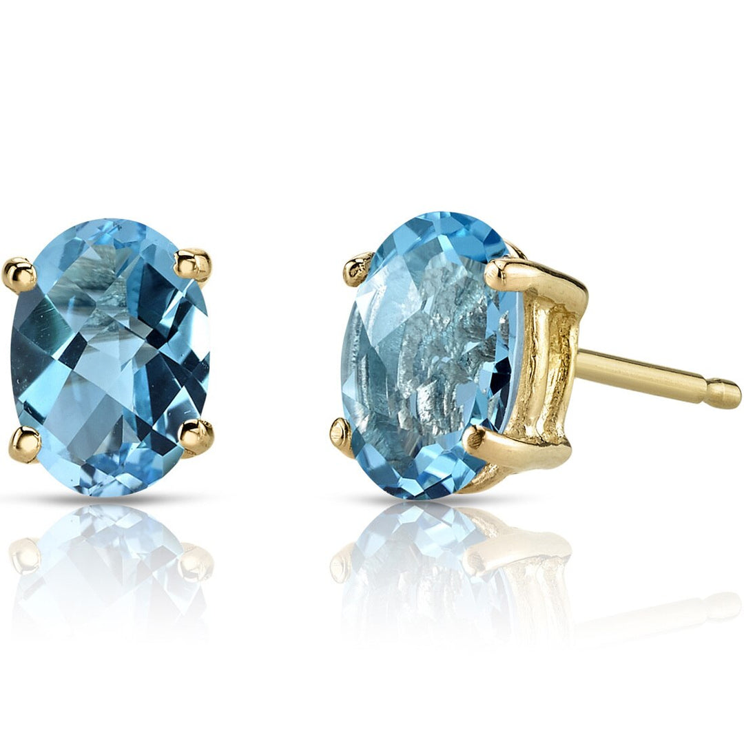 14k Gold Blue Topaz and Filigree stud earrings good