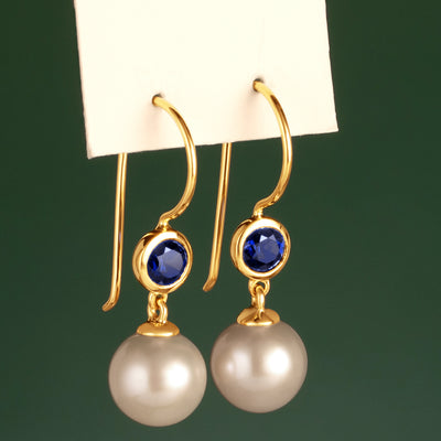 8mm Freshwater Cultured White Pearl and Created Blue Sapphire Earrings in 14K Yellow Gold
