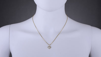 14K Yellow Gold Diamond Accent Dainty Heart Pendant P10088 on a model