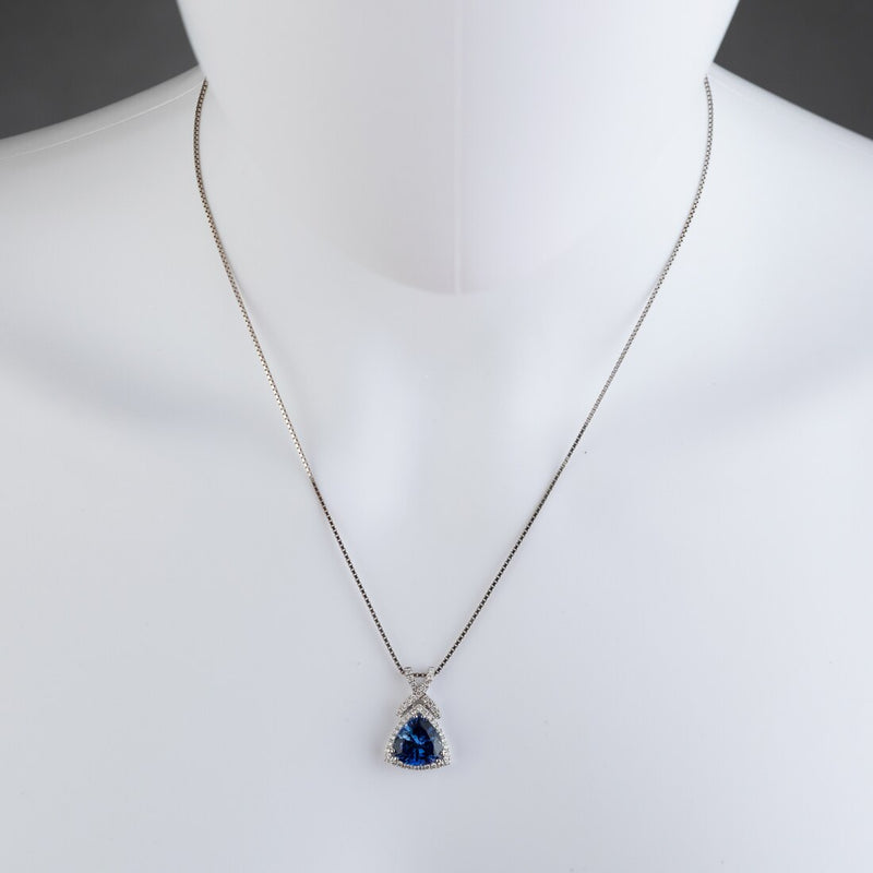 14K White Gold Created Sapphire And Lab Grown Diamond Pendant 6 77 Carats Total Trillion Cut P10122 on a model