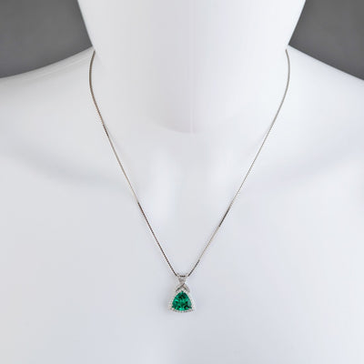 14K White Gold Created Colombian Emerald And Lab Grown Diamond Pendant 4 77 Carats Total Trillion Cut P10124 on a model