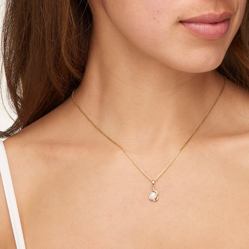Freshwater Cultured White Pearl Pendant In 14K Yellow Gold Round Button Shape 6Mm Dainty Solitaire P10184 on a model