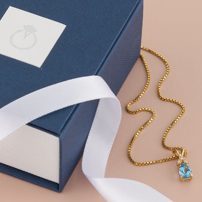 Pear Shape Swiss Blue Topaz and Diamond Pendant Necklace 14K Yellow Gold