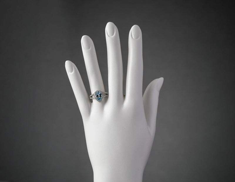 Igi Certified Aquamarine And Diamond 14K White Gold Ring 1 90 Carats Total Pear Shape R63094 on a model