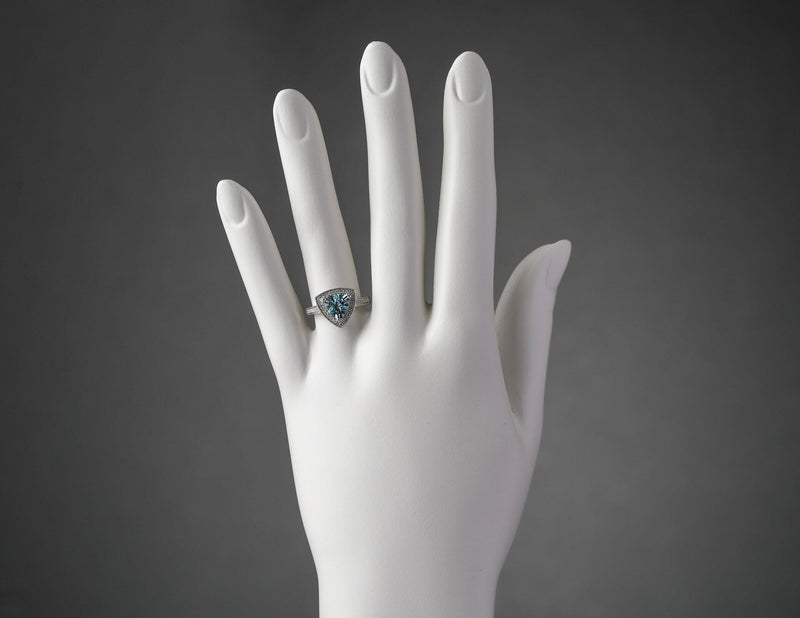 Igi Certified Aquamarine And Diamond 14K White Gold Ring 1 70 Carats Total Trillion Cut R63104 on a model
