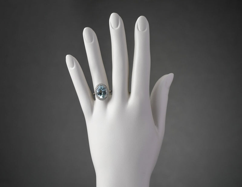 Igi Certified Aquamarine And Diamond 14K White Gold Ring 5 01 Carats Total Oval Shape R63112 on a model