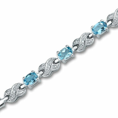 Swiss Blue Topaz Infinity Bracelet Sterling Silver Oval Cut 1.75 Carats