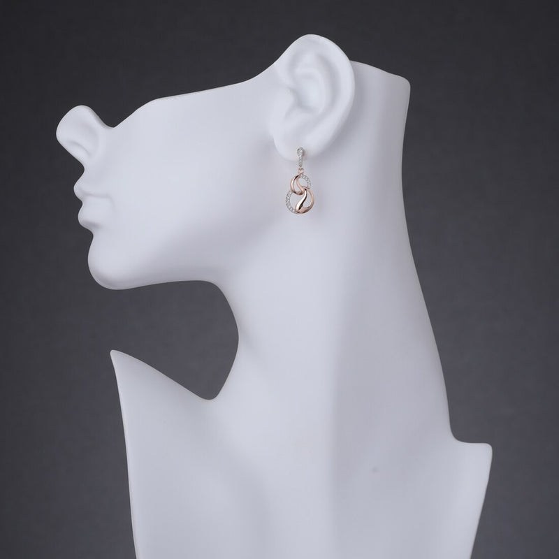 Sterling Silver Simulated Diamonds Yin Yang Rose Tone Dangle Drop Earrings Se9076 on a model