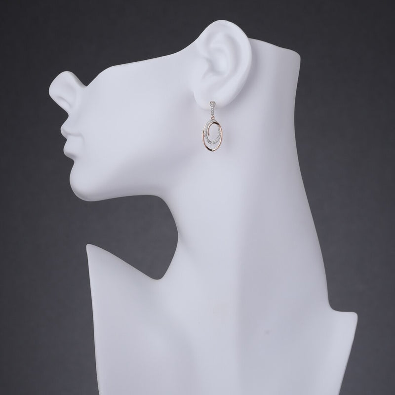 Sterling Silver Simulated Diamonds Double Oval Rose Tone Dangle Drop Earrings Se9078 on a model