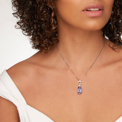 Peora Simulated Tanzanite Pendant Necklace In Sterling Silver Art Deco Dangling Solitaire 5 50 Carats Total Sp12034 on a model