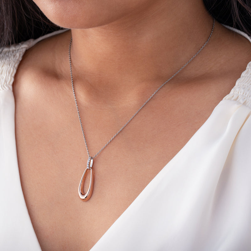 Rose-Tone Sterling Silver Organic Open Teardrop Pendant with 17" Chain + 3" extender on a model