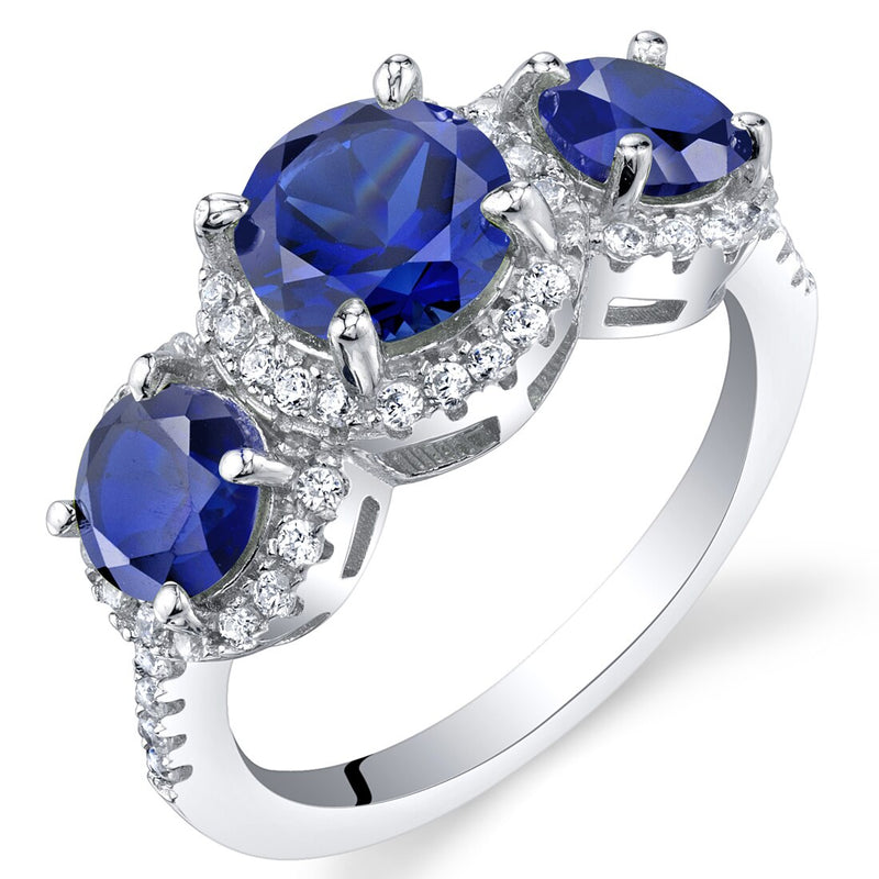 Created Blue Sapphire Sterling Silver 3 Stone Halo Ring 1.50 Carats Sizes 5 to 9