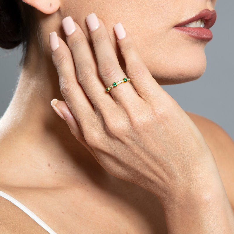 Simulated Emerald Bezel Stackable Ring In Yellow Tone Sterling Silver Sizes 5 To 9 Sr12036 on a model