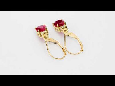 Video of Created Ruby and Diamond Teardrop Leverback Earrings in 14k Yellow Gold.  Includes a Peora gift box. Free shipping, 45-day returns, authenticity guaranteed. E19392