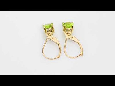 Video of Natural Peridot and Diamond Teardrop Leverback Earrings in 14k Yellow Gold.  Includes a Peora gift box. Free shipping, 45-day returns, authenticity guaranteed. E19390