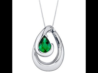 Video of Peora Simulated Emerald Pendant Necklace in Sterling Silver, Wave Solitaire, SP11692. Includes a Peora gift box. Free shipping, 30-day returns, authenticity guaranteed. 
