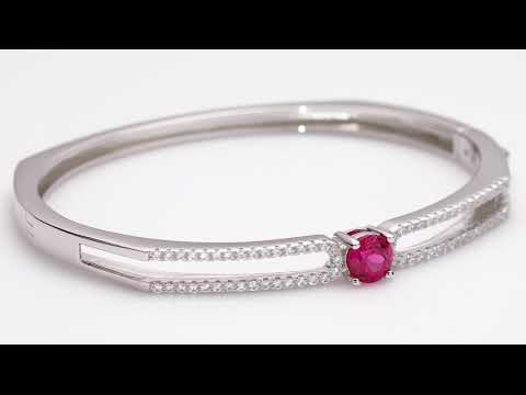 Video of Created Ruby Solaris Bangle Bracelet Sterling Silver 1.25 Carats SB4406. Includes a Peora gift box. Free shipping, 30-day returns, authenticity guaranteed. 