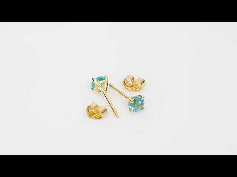 Video of 4mm Round Swiss Blue Topaz Solitaire Stud Earrings in 14K White Gold.  Includes a Peora gift box. Free shipping, 45-day returns, authenticity guaranteed. E19326
