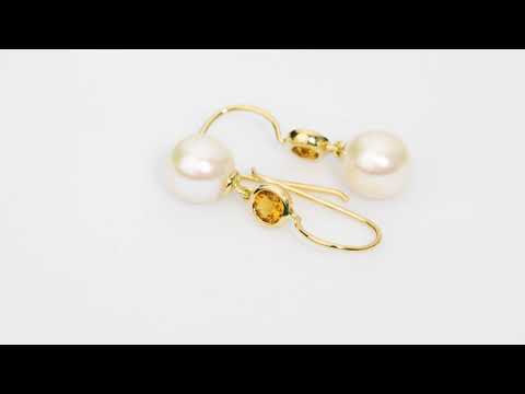 Video of 8mm Freshwater Cultured White Pearl and Citrine Fish Hook Earrings in 14K Yellow Gold. Includes a Peora gift box. Free shipping, 45-day returns, authenticity guaranteed. E19372