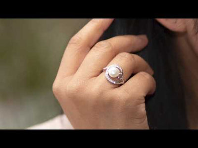 Video of Peora Freshwater Cultured White Pearl Halo Knot Ring in Sterling Silver, Sizes 5-9 SR11034. Includes a Peora gift box. Free shipping, 30-day returns, authenticity guaranteed. 