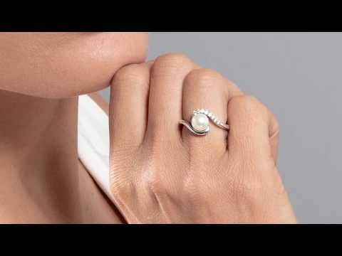 Video of Peora Freshwater Cultured White Pearl Bypass Ring in Sterling Silver Sizes 5-9 SR11032. Includes a Peora gift box. Free shipping, 30-day returns, authenticity guaranteed. 