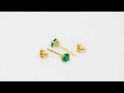 Video of 4mm Round Created Emerald Solitaire Stud Earrings in 14K Yellow Gold. Includes a Peora gift box. Free shipping, 45-day returns, authenticity guaranteed. E19336