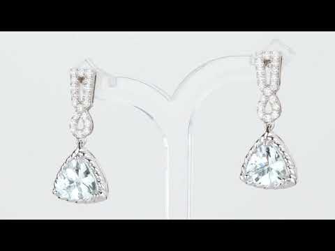 Video of Aquamarine And Lab Grown Diamond Cable Dangle Halo Earrings In 14 Karat White Gold E19214. Includes a Peora gift box. Free shipping, 30-day returns, authenticity guaranteed. 