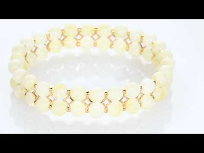 Video of Peora Genuine Baltic Amber Tennis Stretch Bracelet for Women, Double Row Butterscotch Color SB4510. Includes a Peora gift box. Free shipping, 30-day returns, authenticity guaranteed. 