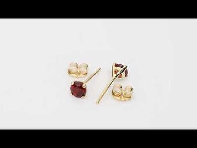 Video of 4mm Round Garnet Solitaire Stud Earrings Garnet in 14K Yellow Gold. Includes a Peora gift box. Free shipping, 45-day returns, authenticity guaranteed. E19328