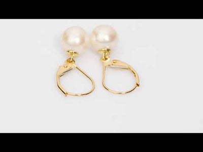 Video of 8mm Freshwater Cultured White Pearl Leverback Earrings in 14K Yellow Gold. Includes a Peora gift box. Free shipping, 45-day returns, authenticity guaranteed. E19302