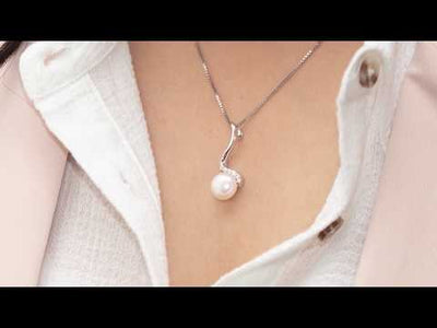 Video of Peora Freshwater Cultured White Pearl Dangling Pendant Necklace in Sterling Silver SP10928. Includes a Peora gift box. Free shipping, 30-day returns, authenticity guaranteed. 