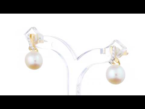 Video of Peora Freshwater Cultured White Pearl Stud Earrings in 14K Yellow Gold, Open Infinity Solitaire. Includes a Peora gift box. Free shipping, 30-day returns, authenticity guaranteed. 
